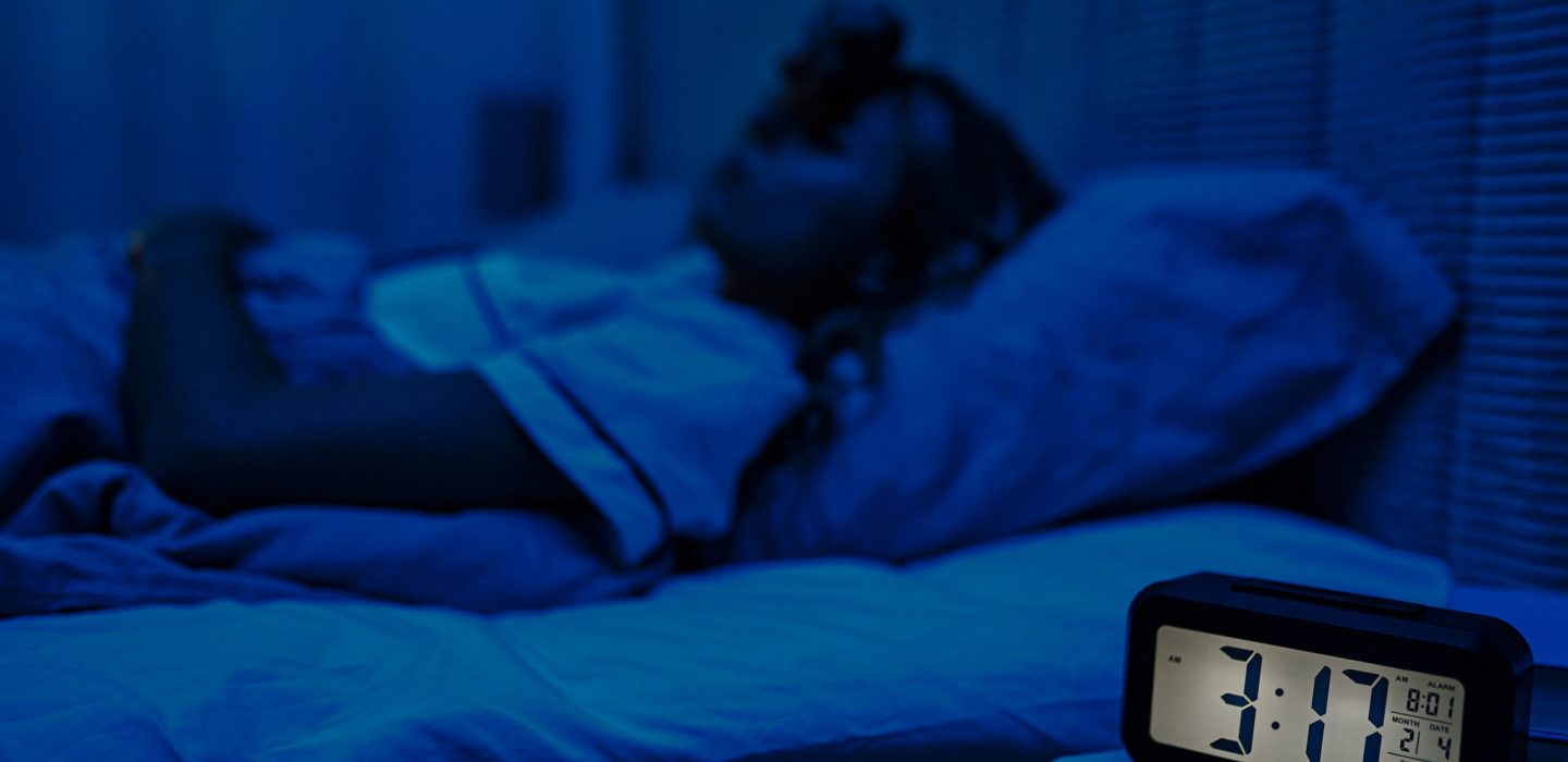 waking up at 3am Person Asleep Near Clock in Blue Bedroom